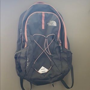 Grey and pink Northface back pack